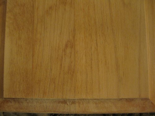 End of drawer, with scratched-up short edge